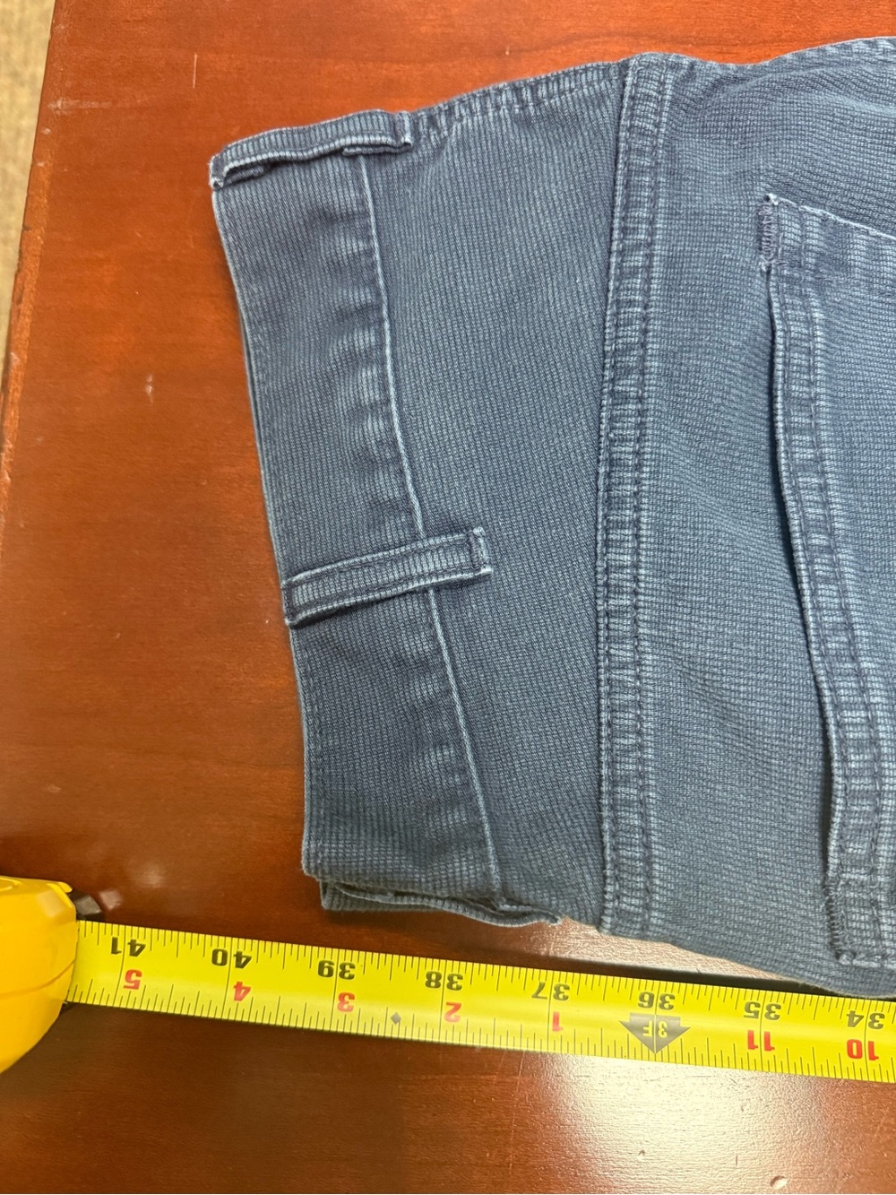 Levi 519 check length in pictures not a true 34x34 in length I don’t believe.